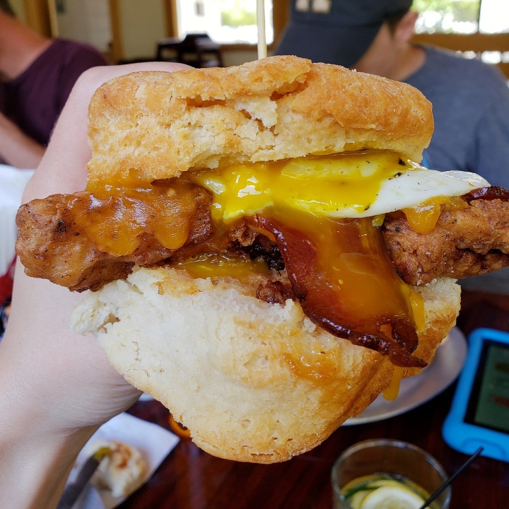 The Litchfield biscuit sandwich, at BisQit in Pawley's Island SC (fried chicken, bacon, cheddar, apple butter, plus à la carte fried egg)
